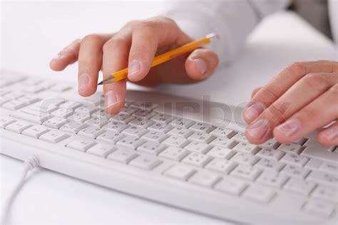 man typing   computer keyboard  work stock image colourbox
