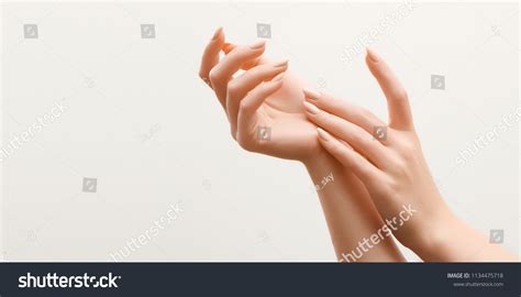 stock photo beautiful woman hands female hands applying cream lotion