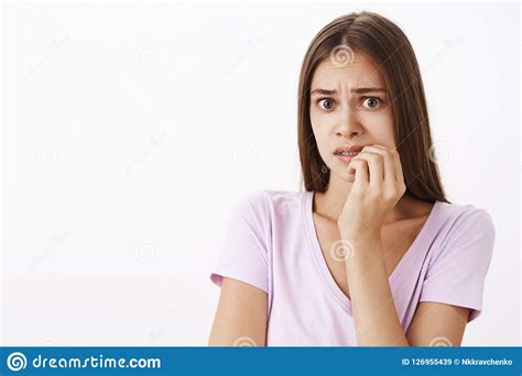 Portrait Of Nervous Teenager Girl Feeling Sick Breathing Into Paper