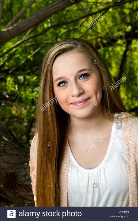 Portrait Of A Beautiful Teen Girl With Long Blond Hair