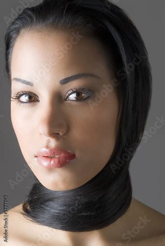 Beautiful Latina Girl In A Close Up With Hair Around Her Neck Stock