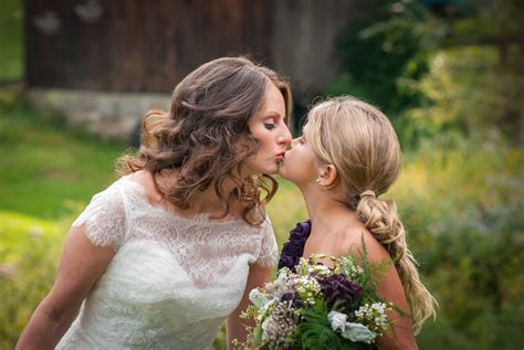 bride and her daughter kissing a mothers love mother