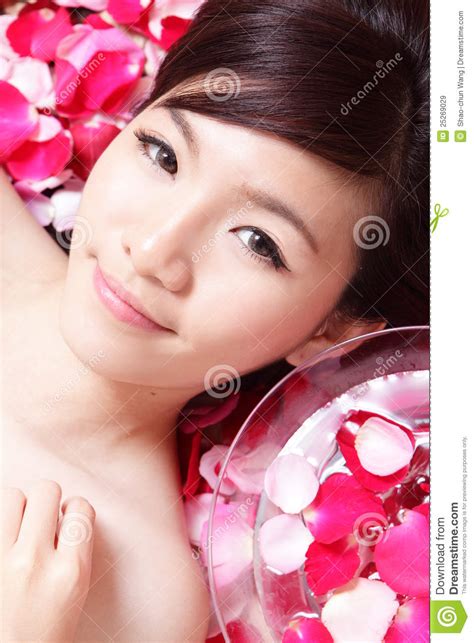 health spa woman face close   red rose stock image image