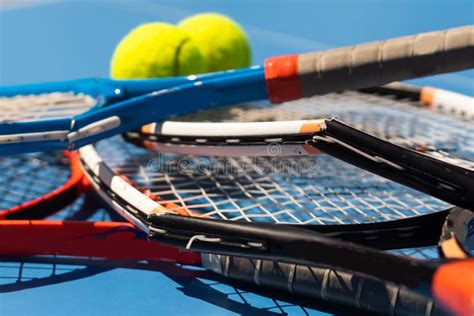 broken tennis racket blue tennis court stock photo image