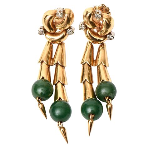 retro carved jade 14 karat gold swirl drop earrings for sale at 1stdibs