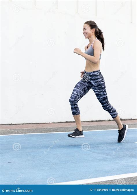 white woman running  track stock photo image  runner endurance
