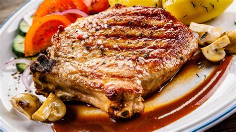 curtis stone s pork chops with cider dijon pan sauce and