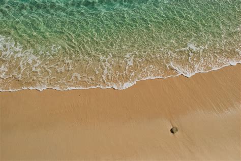 sand  water pictures   images  unsplash