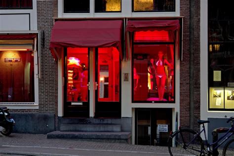 amsterdam s red light district places ban on tourists staring at sex workers