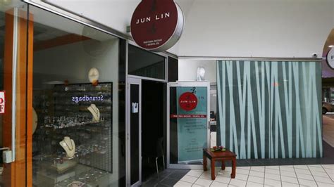 police investigate suspicious fire  jun lin massage  hobart