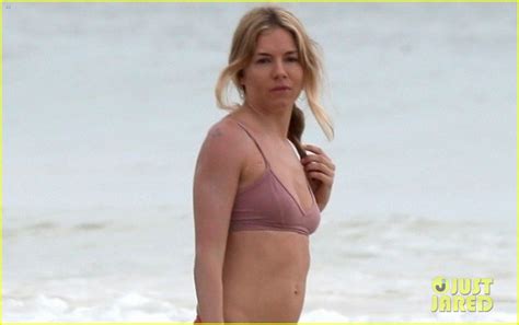 full sized photo of sienna miller hits the beach in bikini 03 photo