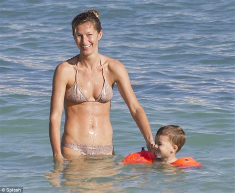 gisele bundchen dotes on son benjamin as they enjoy a