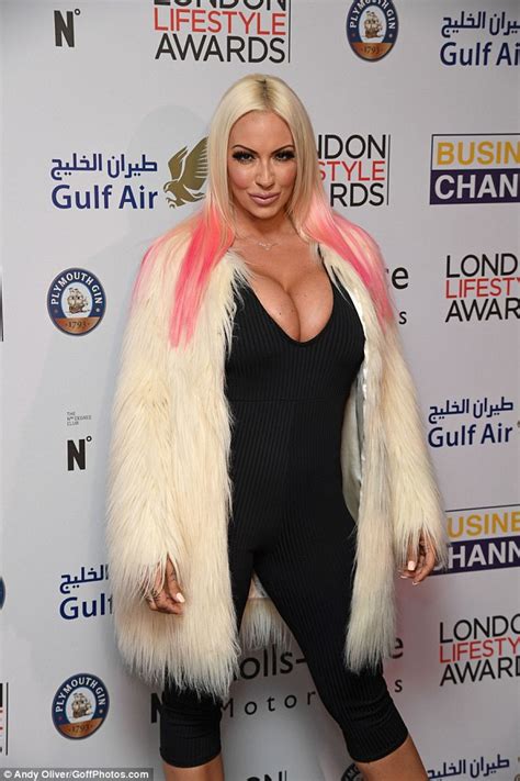 jodie marsh shows off her very ample cleavage at the