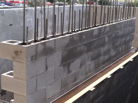 durable waterproofing  concrete masonry walls redundancy required construction specifier