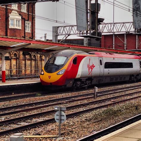A Virgin Trains Class 390 Pendolino Arrives At Crewe With A Service For