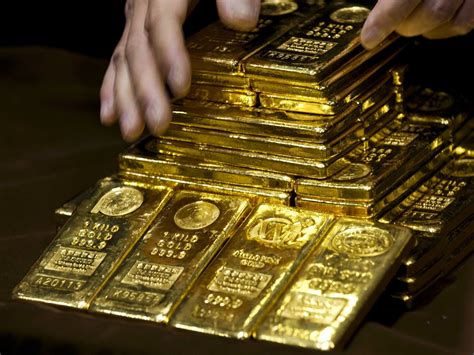 gold bulls cut wagers  goldman sees  losses gold  precious metals   news