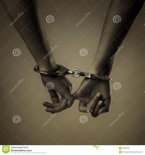 two girl hand and handcuffs stock image image 20032041