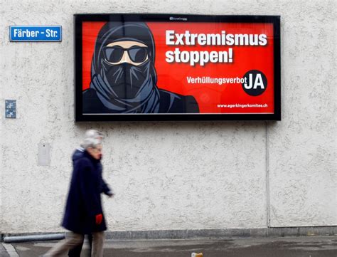 swiss agree to outlaw facial coverings in burqa ban vote