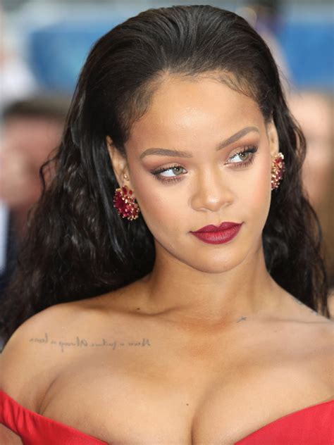 Rihanna Showed Off Her Cleavage On Display While Modeling Red Bra