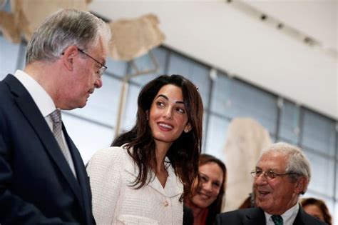 the all powerful amal clooney jets into athens as she gets back to business after lavish wedding