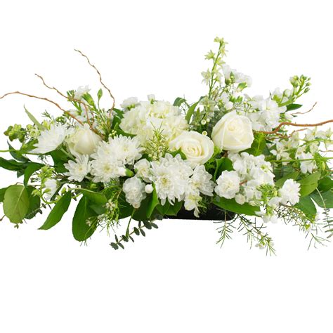 classic white centerpiece designed  karins florist
