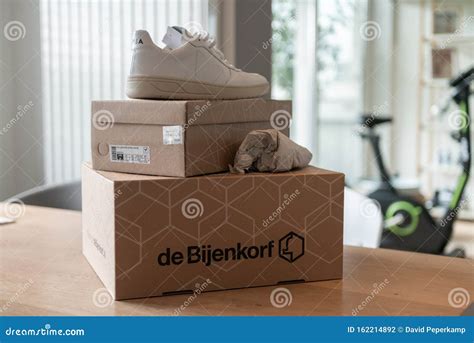de bijenkorf  package delivery unboxing package  shopping fashion shoes white