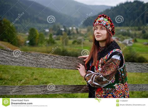 beautiful brunette woman wearing traditional ukrainian