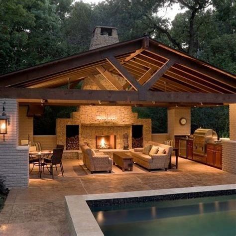 pool house  outdoor kitchen outdoorfireplacespatio outdoorkitchengrillawesome modern