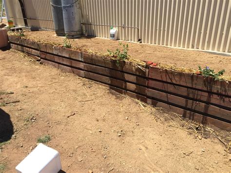 pallet retaining wall cheap landscaping ideas wood retaining wall