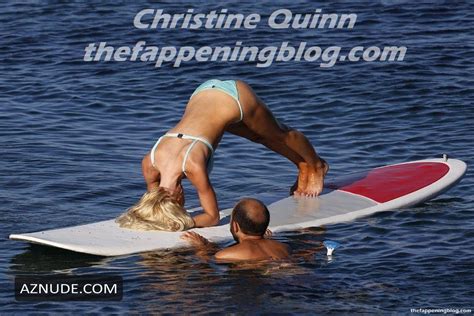 christine quinn sexy seen practicing yoga on a board with