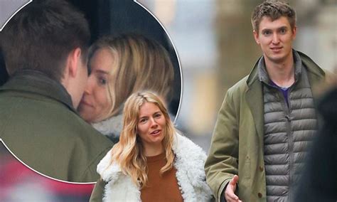 sienna miller 37 shares a kiss with her art gallery