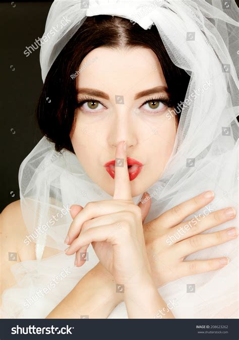 sexy young woman wearing  wedding veil stock photo