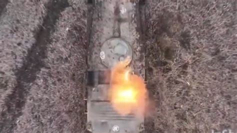 wiped  ukraine footage shows drone dropping grenade  russian armor fortyfive
