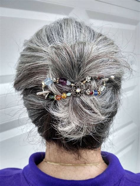 flexi hair clip in a gray hair messy bun bun hairstyles