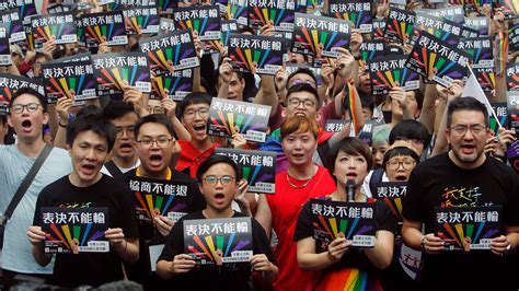 taiwan legislature approves asia s first same sex marriage