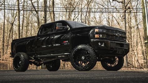 black lifted chevy truck