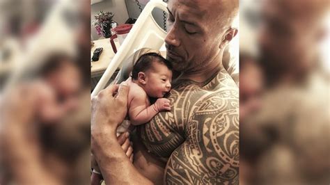 rock welcomes  baby girl  delivers heartfelt advice   fathers