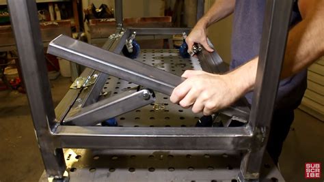 heres  cool idea  making retracting casters   welding table  workbench welding