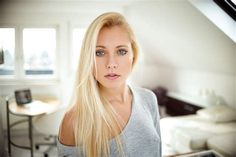 women blonde blue eyes face portrait no bra depth of