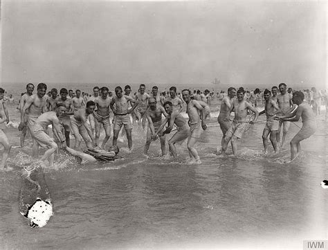 Vintage Soldiers Swimming And Playing In The Water During