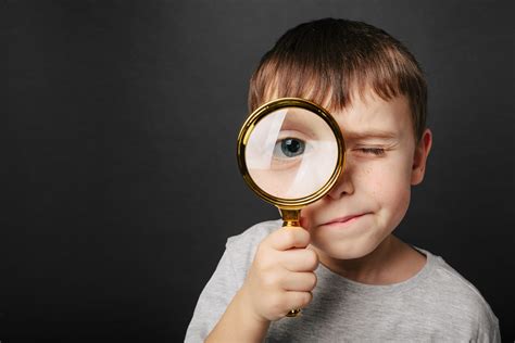 child   magnifying glass   black backgrounds big kid eye