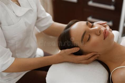 Spa Massage Beautiful Woman Getting Facial Beauty Treatment Stock