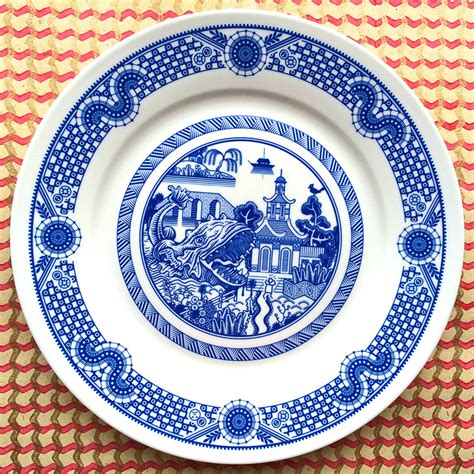 disastrous scenarios depicted  traditional blue porcelain dinner plates
