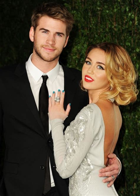 miley cyrus and liam hemsworth deny calling off summer