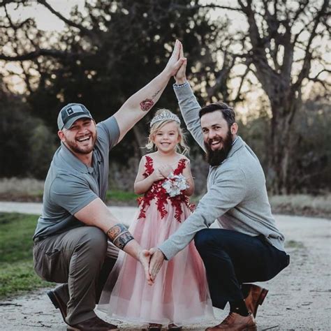 girl s adorable photoshoot with 2 dads goes viral hint they aren t same sex