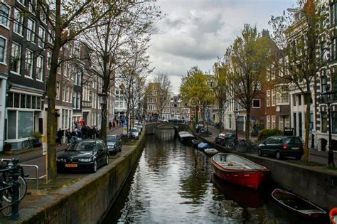 canal  blauwburgwal street  amsterdam editorial photography image  destination