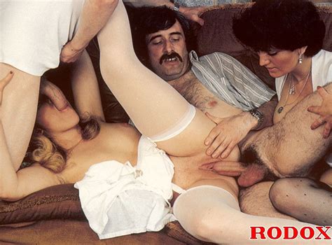 two retro ladies with sensual stockings sharing two guys ass point
