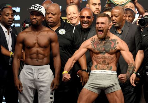 floyd  conor  weight  mcgregor supporters steal  show  weigh  complex