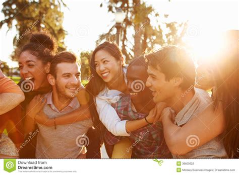 Group Of Friends Having Fun Together Outdoors Stock