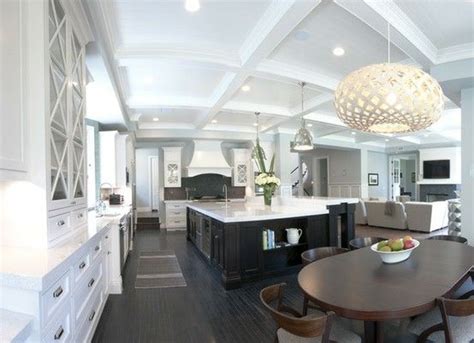 open spacious floor plan   kitchendining room  striking whites  dark timbers love